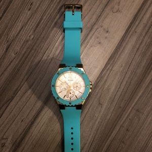 Guess Woman’s Turquoise Gold Sporty Watch
